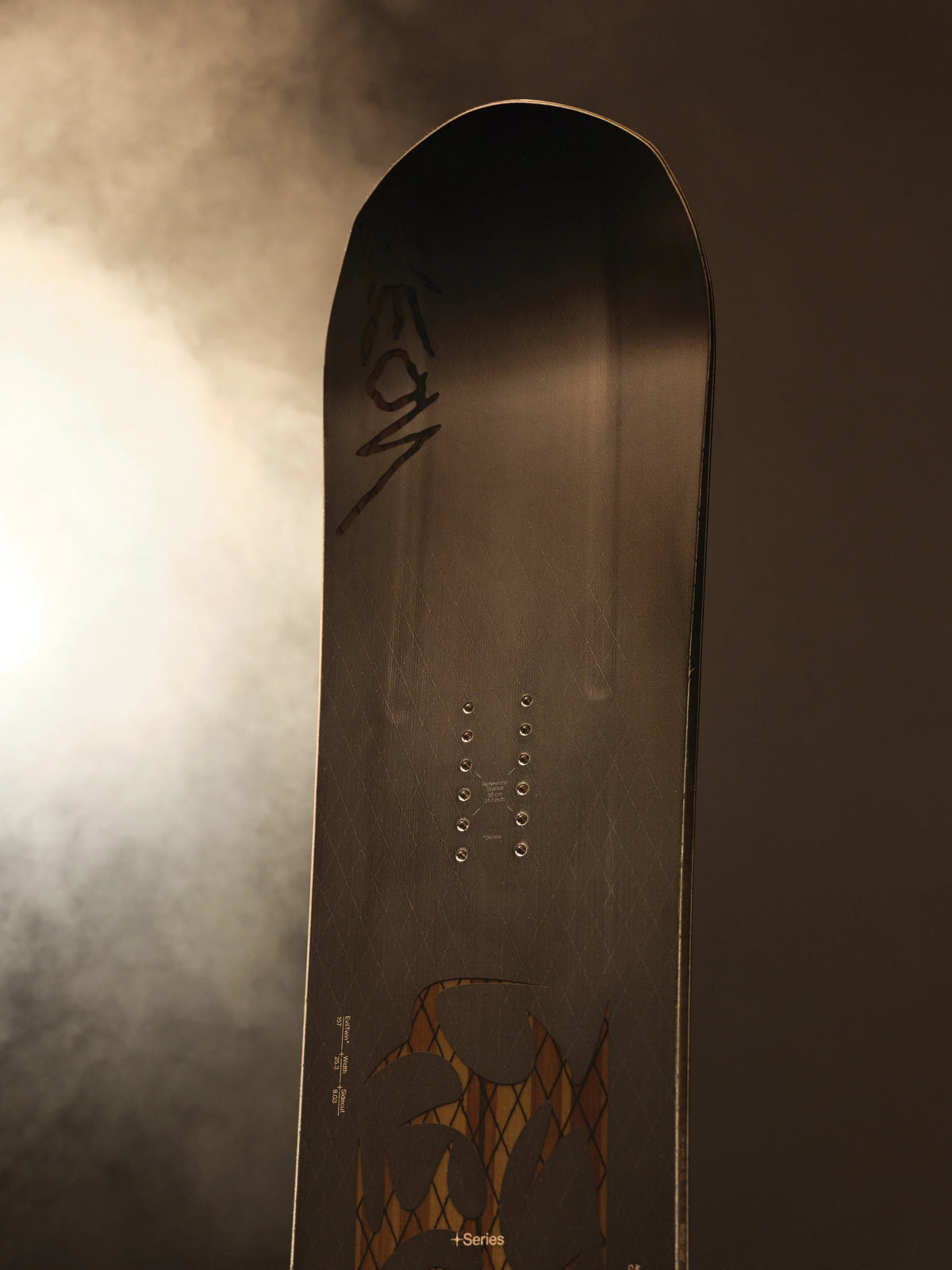 Bataleon Evil Twin+ snowboard for men, showing the colorful top surface with graphic design and twin-tip shape suitable for freestyle riding.