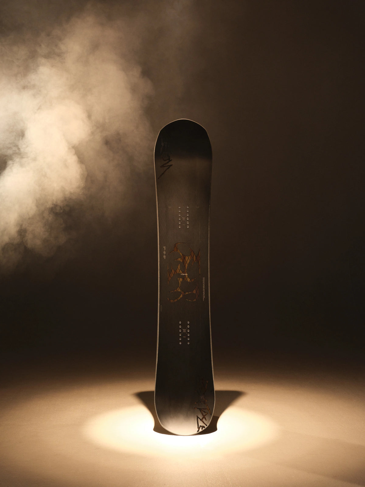 Bataleon Evil Twin+ snowboard for men, showing the board’s design and graphics on a lifestyle background.