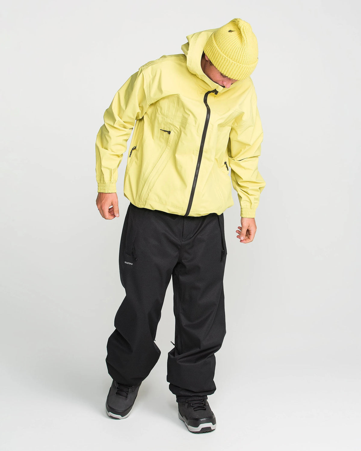 Volcom men's Arthur 20K snow pants in black, side view with waterproof shell and articulated fit