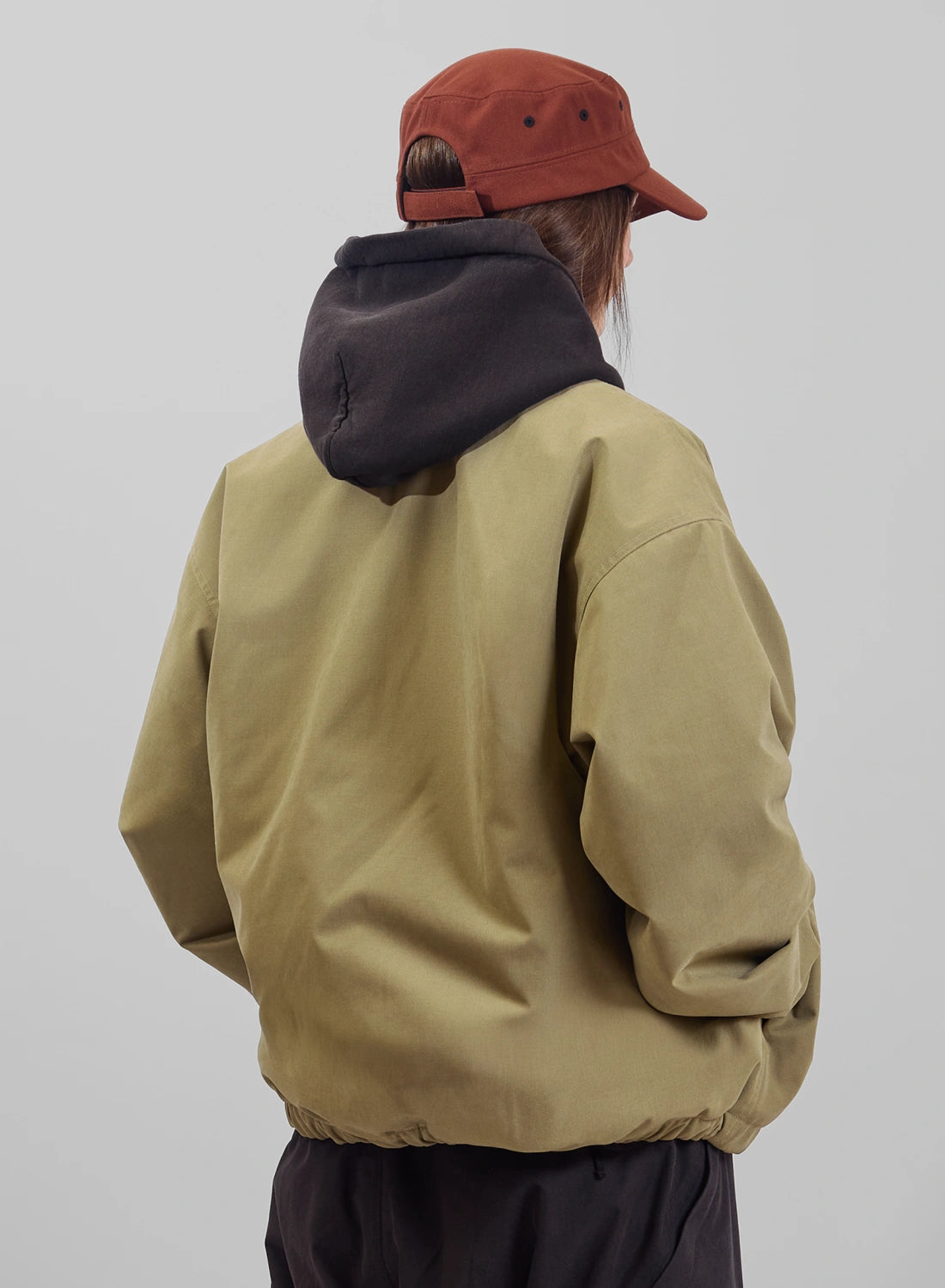 Back view of Burton AG Dirtshift Jacket for men, beige softshell snow jacket with Burton branding and functional design.