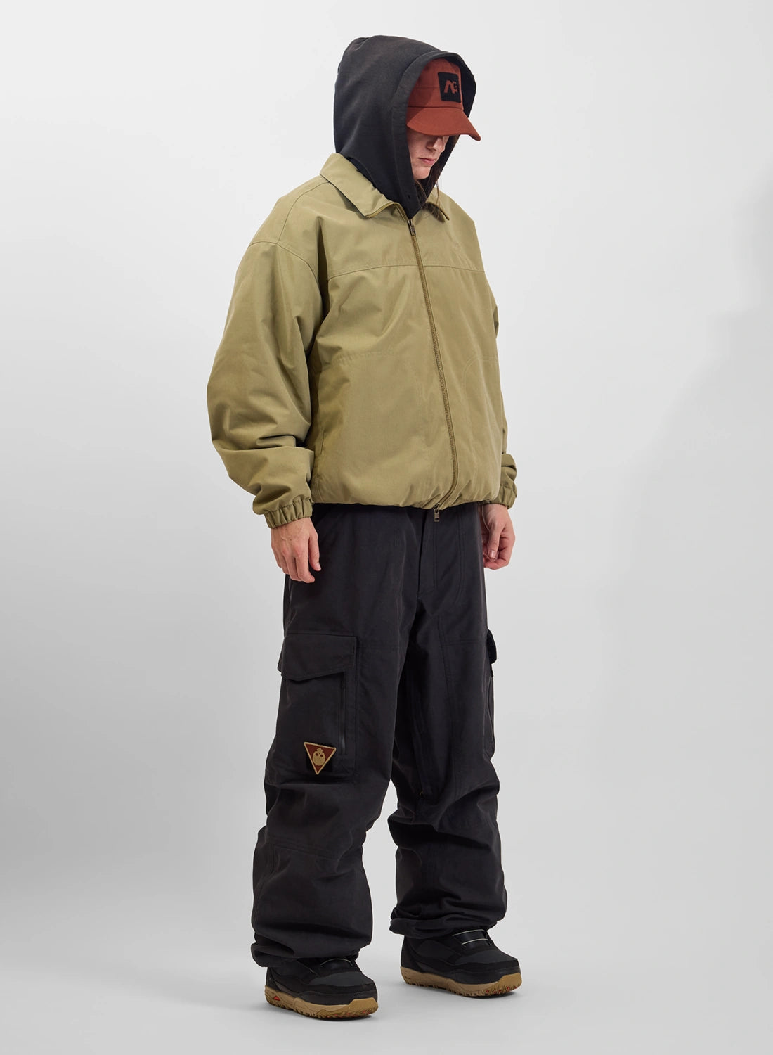 Men's Burton AG Dirtshift Jacket in beige, snow jacket with durable softshell material and adjustable hood for outdoor winter activities.