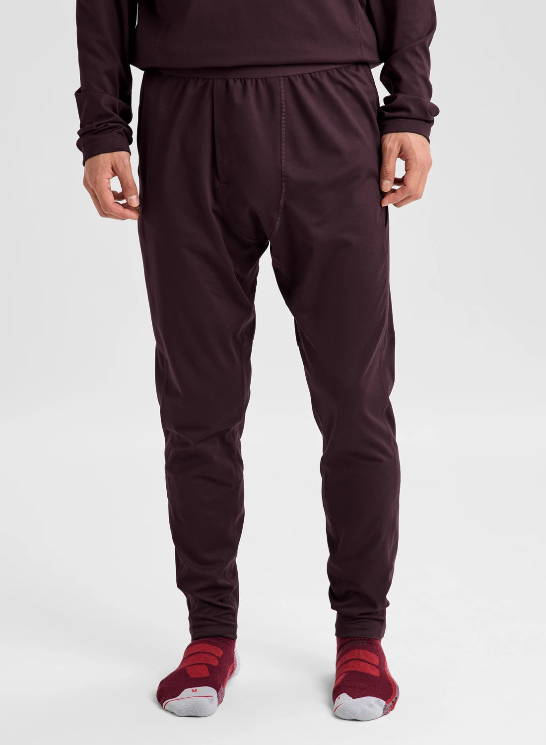 Men's Burton synthetic midweight base layer pants in Bear Hug Brown, front view showing soft, insulating fabric for cold-weather layering.
