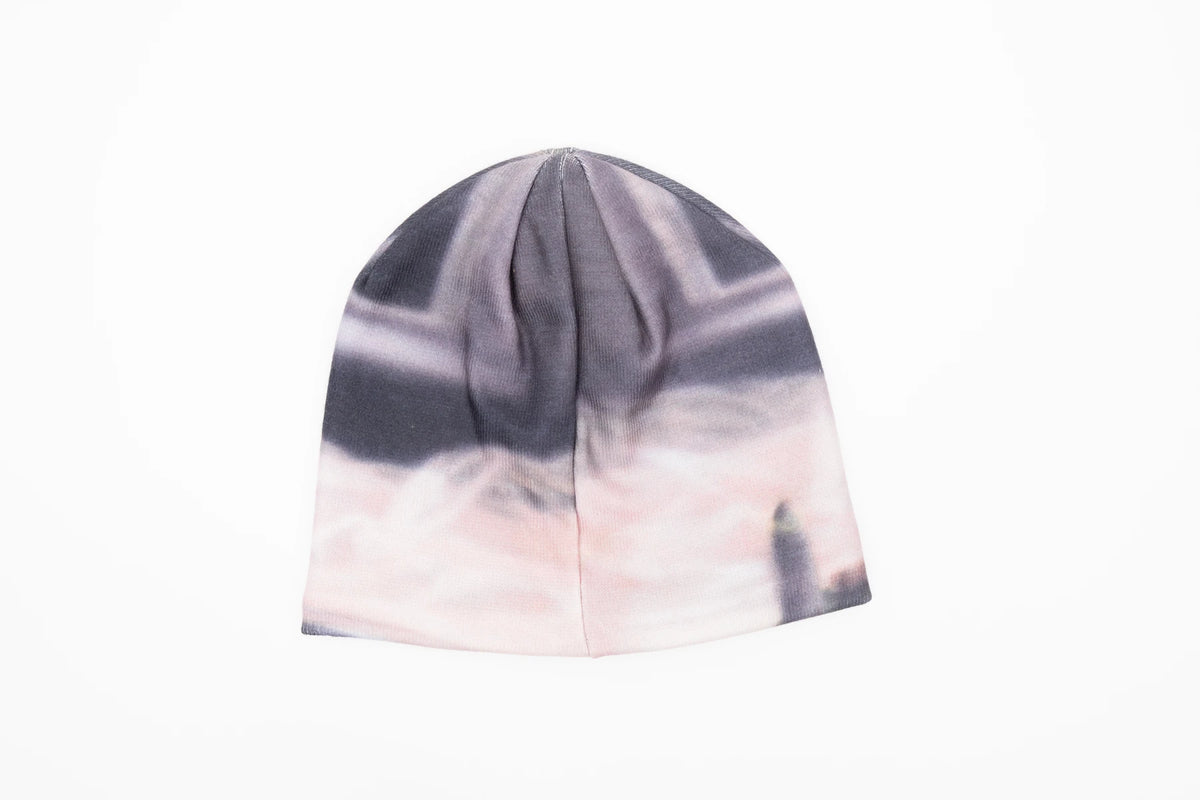 Public Snowboards Skully Beanie with rose print, featuring colorful floral design on soft fabric, perfect for cold weather accessories.