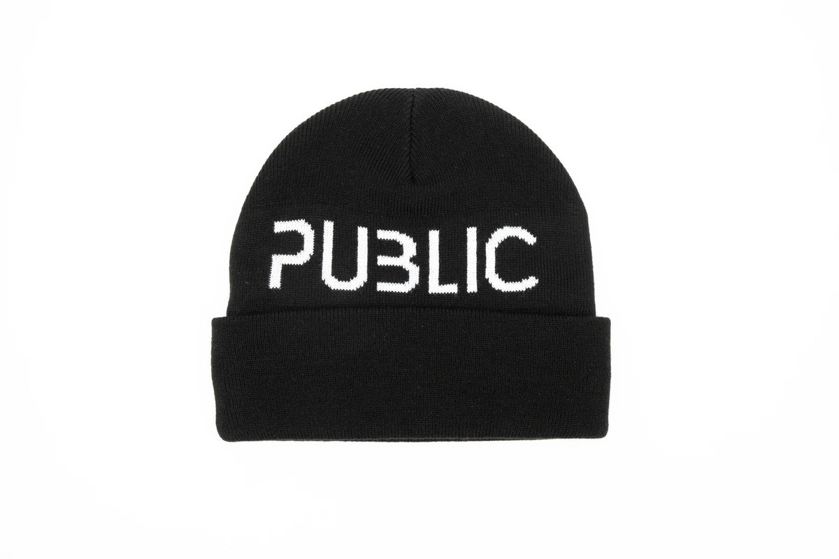Black Public Snowboards Logo Cuff Beanie showing the front view, designed for warmth and style in cold weather.