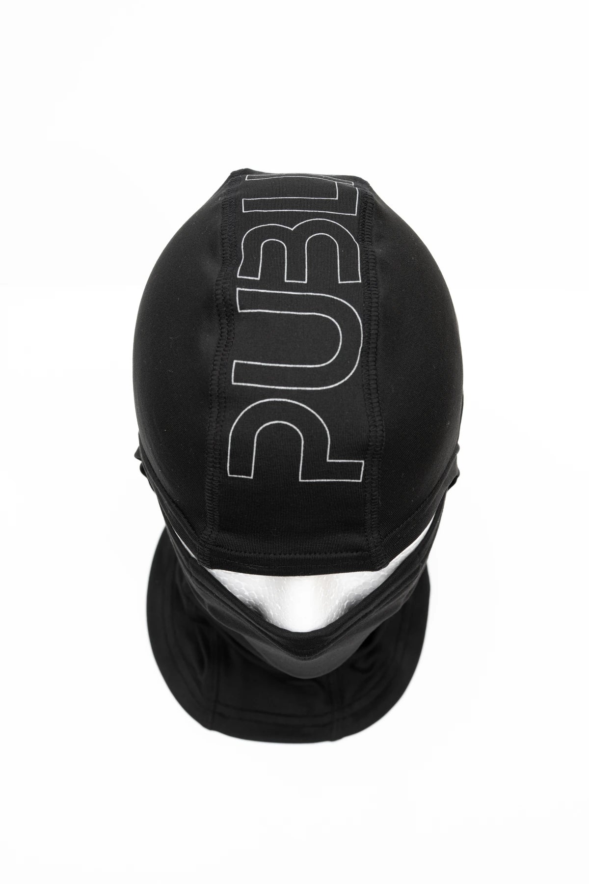 Public Tech Balaclava in black, snow face protection accessory from Public Snowboards, showing the top view with snug fit and breathable fabric.