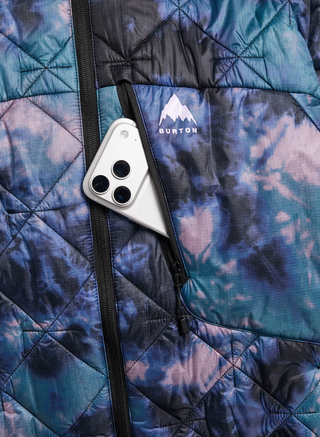 Women's Burton Reserve synthetic insulated hooded jacket in Crystal Dye with chest zipper detail, perfect for winter snow conditions.