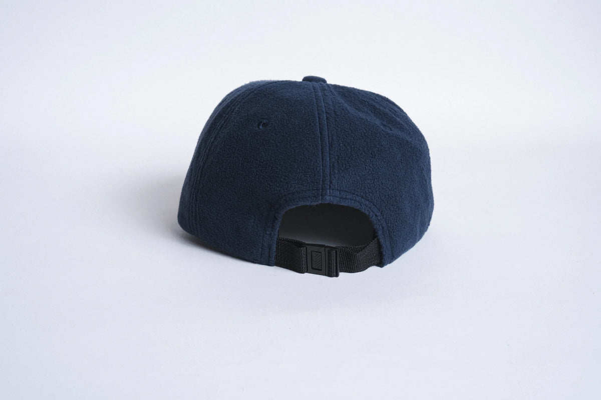 Autumn Headwear six-panel fleece cap in midnight blue, casual accessory with a soft fleece texture and six-panel design.