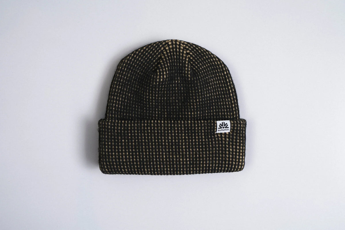 Black Autumn Static Beanie from Autumn Headwear, cozy knit winter accessory with a classic, stylish design.