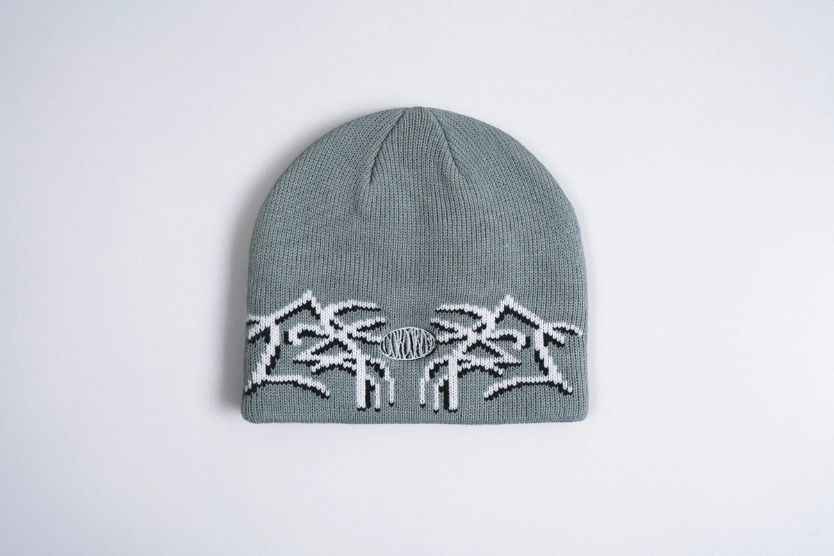 Light blue Corduroy Airbrush beanie by Egan Wint, made of soft corduroy fabric, styled as a casual headwear accessory.