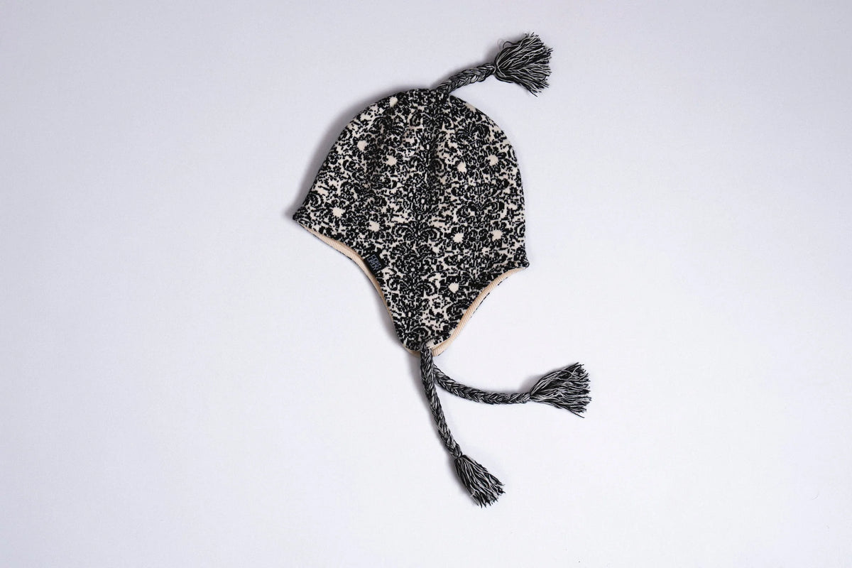 Corduroy Headwear natural corduroy doily ear flap beanie, cozy winter accessory with ear protection and stylish design.