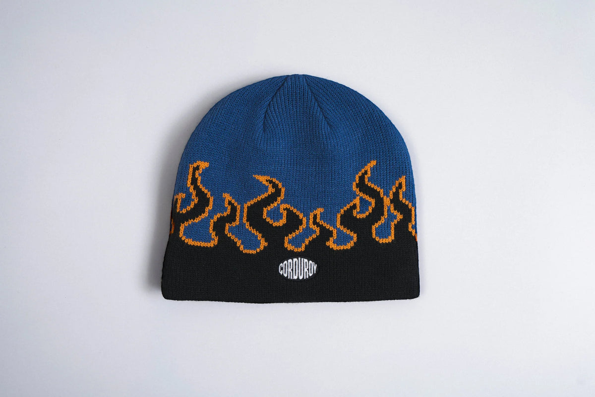 Corduroy LL Burn Skully Beanie in very blue, stylish accessory by Corduroy Headwear featuring a ribbed corduroy texture.