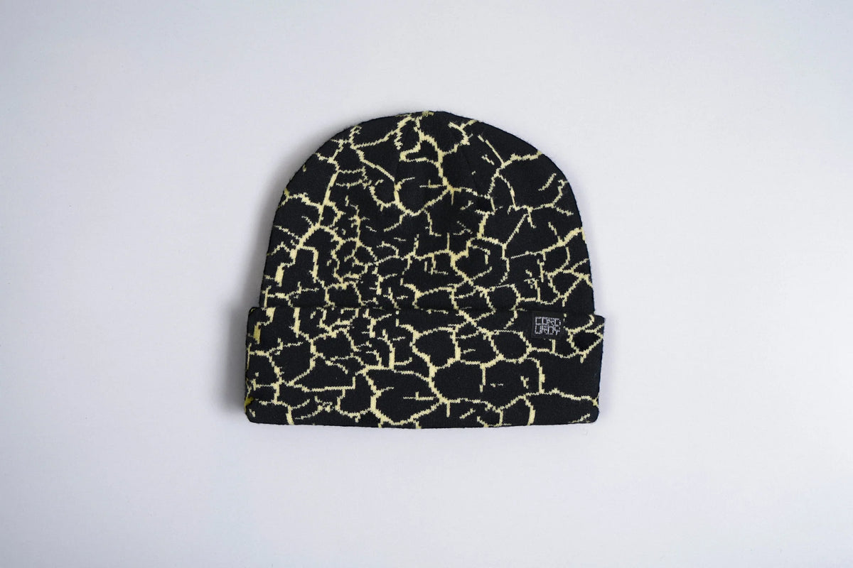 Black Corduroy Rumble Beanie by Corduroy Headwear, showcasing a cozy, textured knit hat on a plain background.