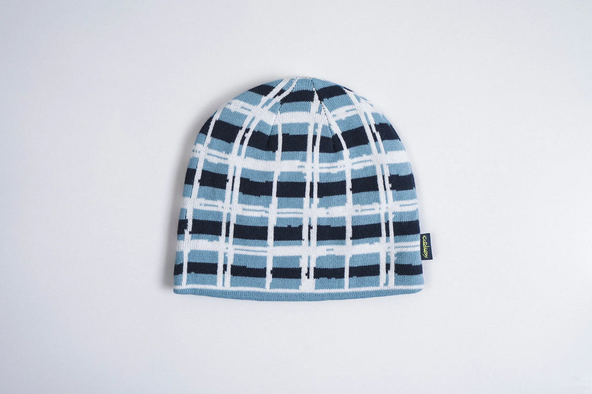 Corduroy Tartan Justin Phipps beanie in sky blue with a soft, textured fabric and classic tartan pattern, designed for cozy style.