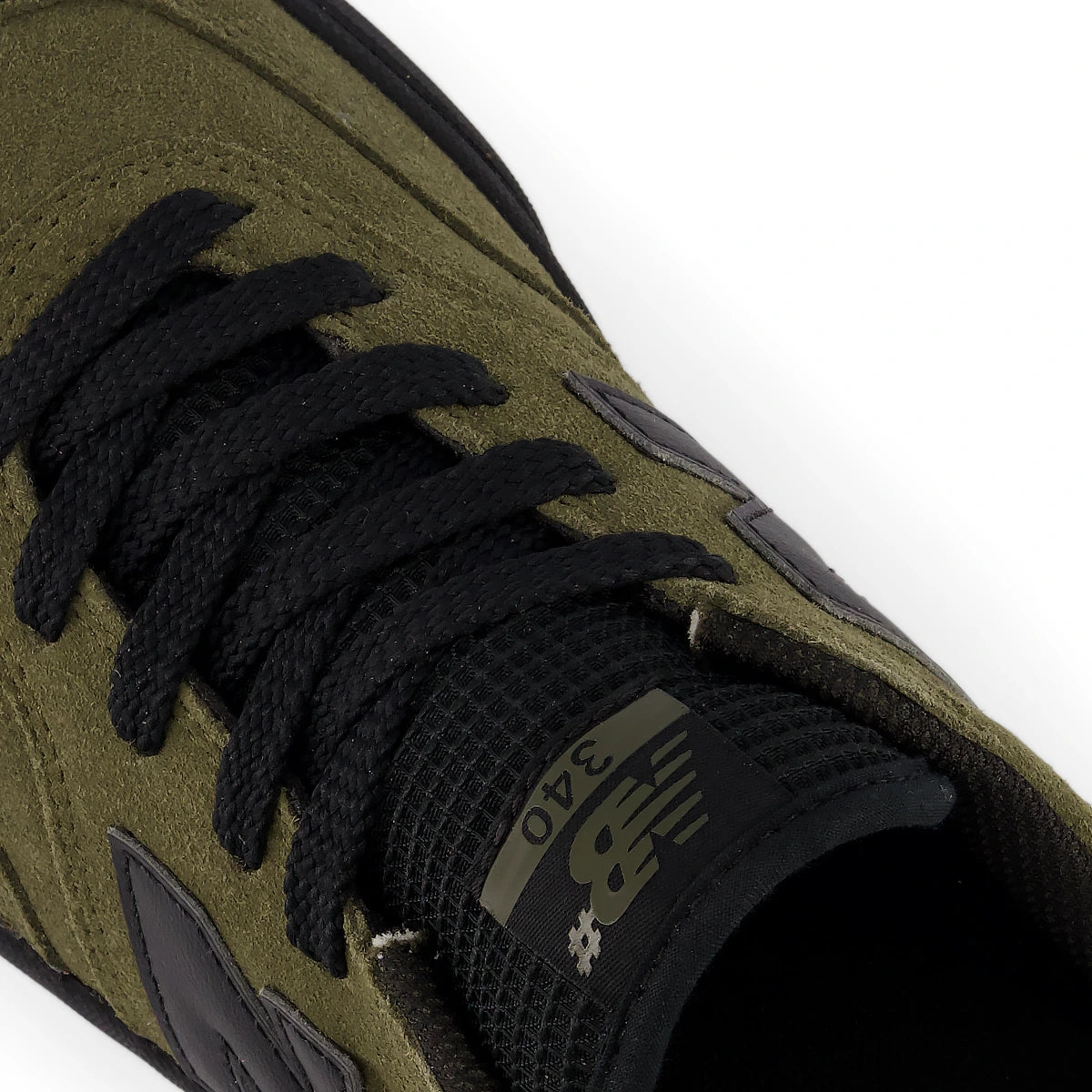 New Balance Numeric 340 skate shoes in olive and black, showing toe and laces detail