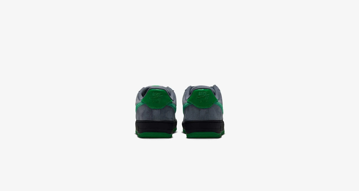 Nike SB 'Nocturnal' Air Force 1 Low SE sneakers in cool grey and court green, heel view