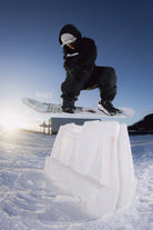 Bataleon Ghost FASE snowboard bindings for men in bone white, showcasing a sleek design and secure adjustable straps.