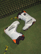 Men's Bataleon Salsa Double BOA snowboard boots in gray sunset with a lifestyle shot, showcasing the snowboard boots' design and fit.