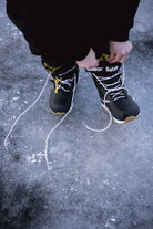 Black Bataleon Salsa Lace Snowboard Boots for men, durable snowboarding boots with secure lacing system, lifestyle shot.
