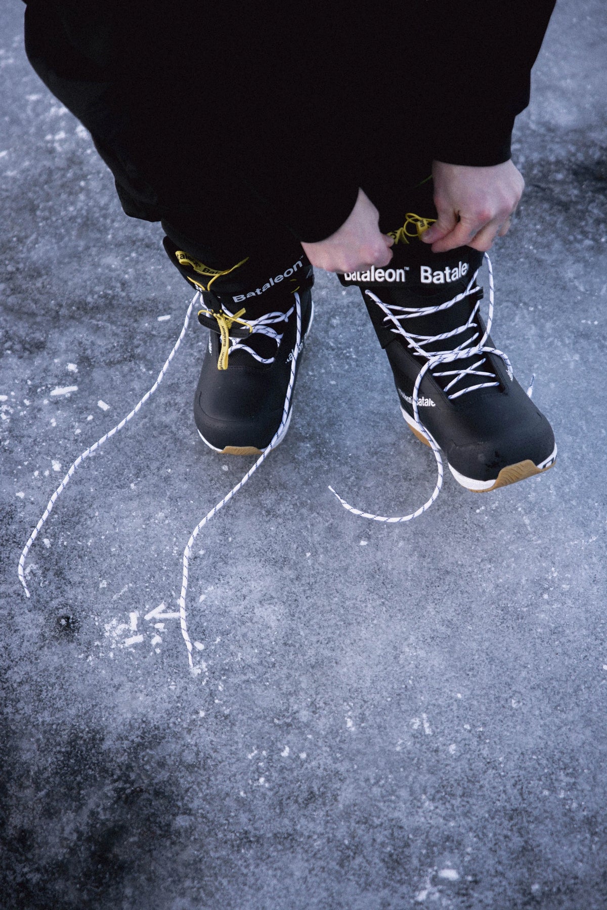Black Bataleon Salsa Lace Snowboard Boots for men, durable snowboarding boots with secure lacing system, lifestyle shot.
