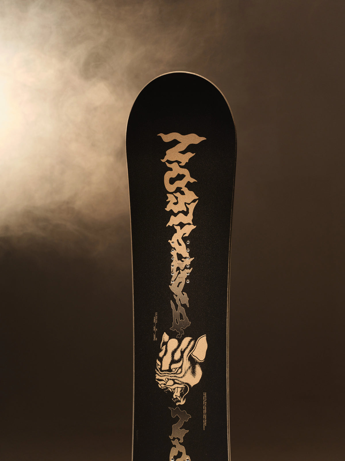 2027 Bataleon Disaster+ snowboard for men, showcasing the snowboard's design and graphics on a lifestyle background.