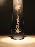 2027 Bataleon Disaster+ snowboard for men, showcasing a sleek design and versatile riding features on a snowy landscape.