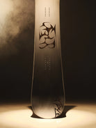 2027 Bataleon Evil Twin+ snowboard for men, showcasing its twin shape and stylish design on a lifestyle background.