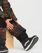 Volcom Kids' Little Flurry one-piece snowsuit in cheetah print, full-body youth snowwear outfit
