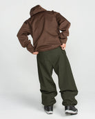 Volcom men's Lapper snow pants in dark green, 2027 style, side view