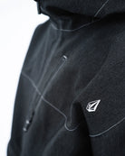 Volcom men's Top Stitch snow jacket in black denim, front view