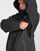 Volcom men's Top Stitch snow jacket in black denim, front view with hood and zip closure