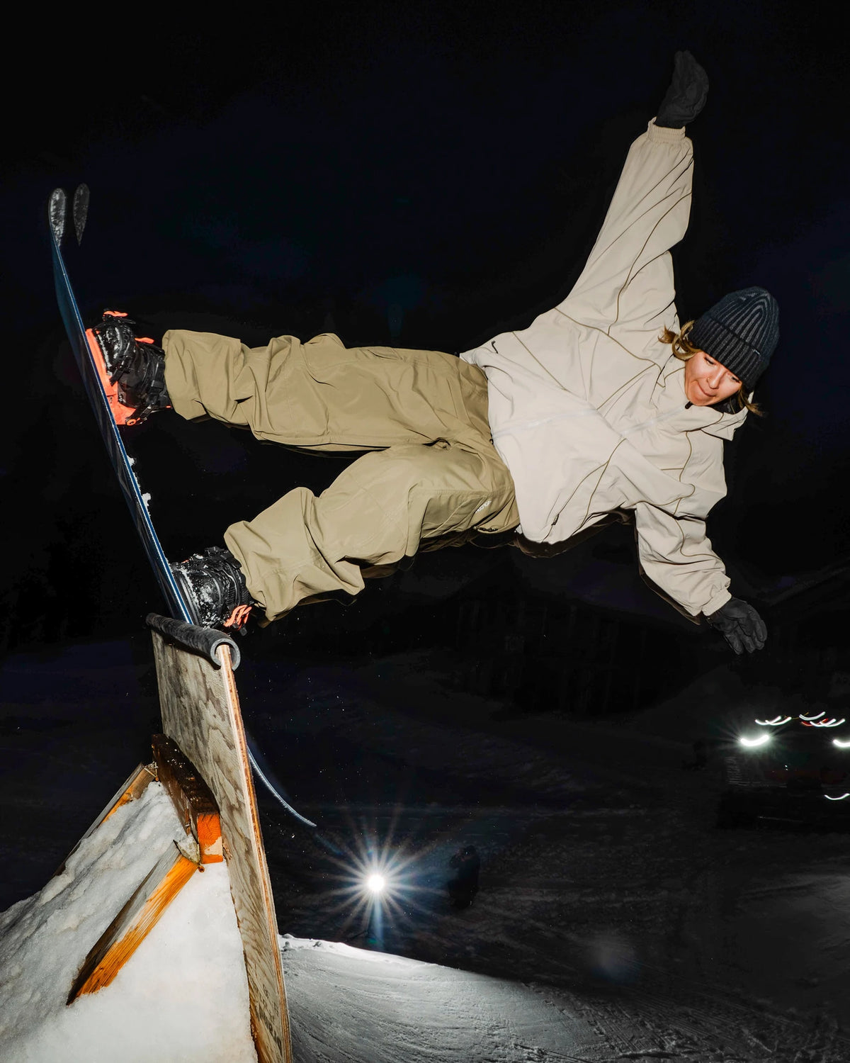 Volcom Liftline 20K snow pants in teak, unisex snowboarding pants shown in rail action