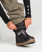 Volcom Unisex Liftline 20K snow pants in teak, waterproof winter trousers shown from the side