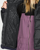 Volcom women's Avalon Puff snow jacket in black, front view with quilted insulation and hood