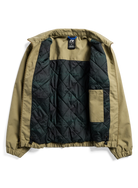 Interior view of Burton AG Dirtshift men's beige snow jacket, showcasing softgoods and jacket lining details.