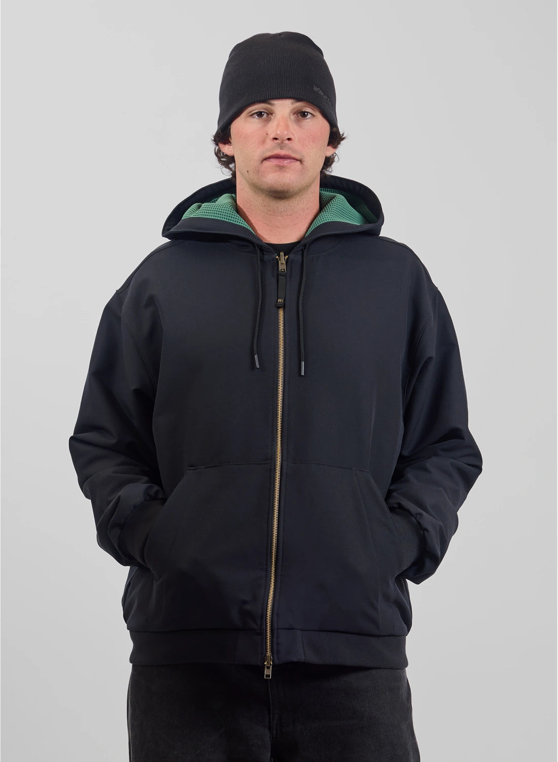 Men's Burton AG Toughy reversible full-zip hoodie in true black and dirty money, shown from the front.