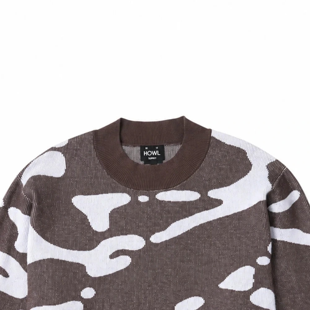 A crewneck sweater featuring an abstract organic pattern in white over a dark brown base, displayed flat against a solid white background.