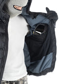 Black Howl Supply puffy men's snow jacket with a hood and goggle pocket, designed for warmth and outdoor winter activities.