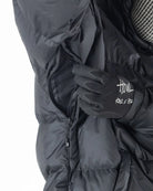 Men's black Howl Supply puffy snow jacket with a quilted design and hood, suitable for cold weather.
