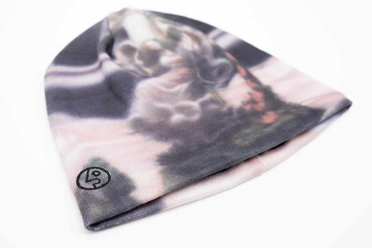 Public Snowboards Public Disorder Skully Beanie with rose print, shown from multiple angles, cozy knit accessory for cold weather.