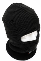 Public Snowboards distressed black balaclava worn on head, designed for snow face protection and winter outdoor activities.