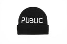 Black Public Snowboards Logo Cuff Beanie showing the front view, designed for warmth and style in cold weather.