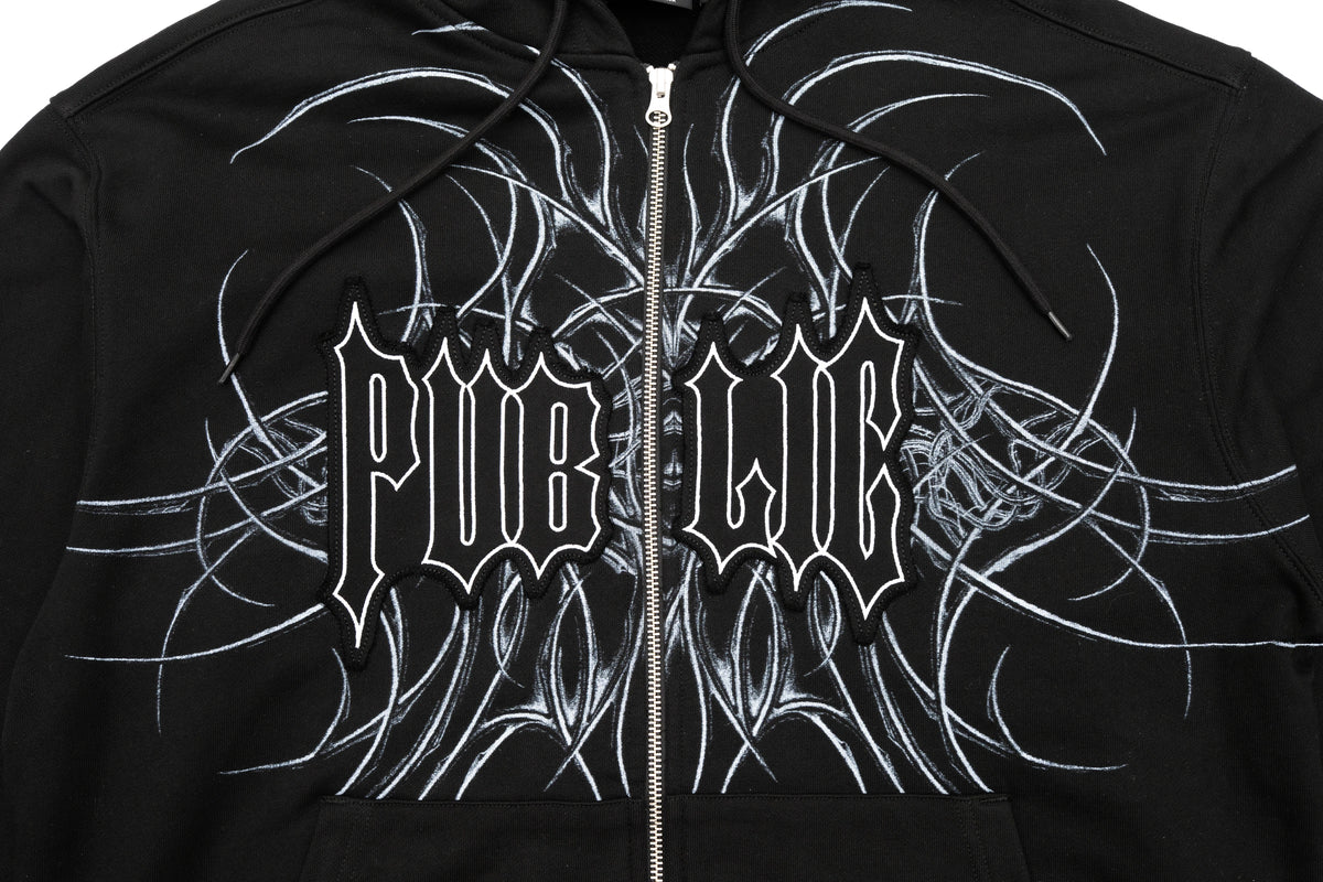 Black men's zip-up hoodie from Public Snowboards with graphic detail, ideal for casual wear and cold weather.