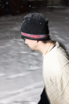 Public Snowboards black and red stretch logo skully beanie, stylish winter accessory with a snug fit and bold design.