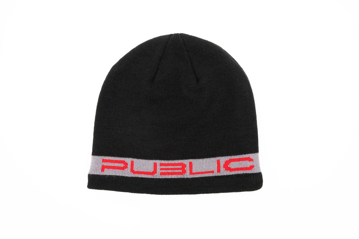 Public Snowboards Public Stretch Logo Skully Beanie in black and red, featuring a stretchy fit and bold logo on the front.