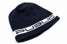 Public Snowboards navy stretch logo skully beanie with white logo, made from soft, stretchy fabric, front view.