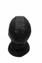 Public Snowboards black balaclava for snow face protection, shown from the back, made of breathable, snug-fitting fabric.