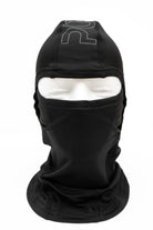 Black Public Tech Balaclava by Public Snowboards, a face protection accessory designed for snowboarding and winter outdoor activities.