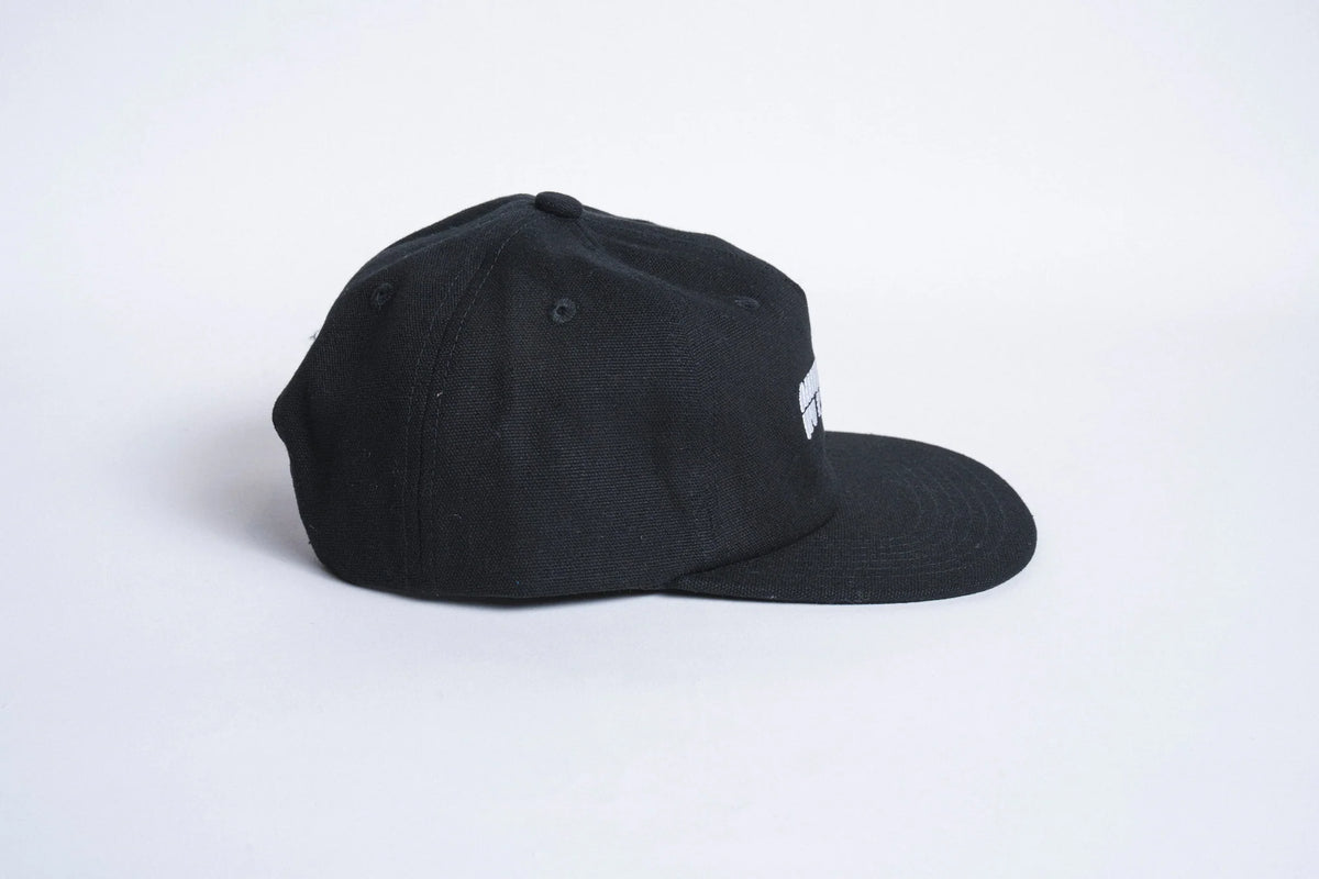 Black Autumn Canvas Six Panel Snapback hat from Autumn Headwear, showing front view with adjustable strap and six-panel design.