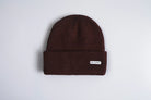 Autumn Headwear Autumn Cord Beanie in oxblood, cozy knit accessory with cord detailing, perfect for fall weather.