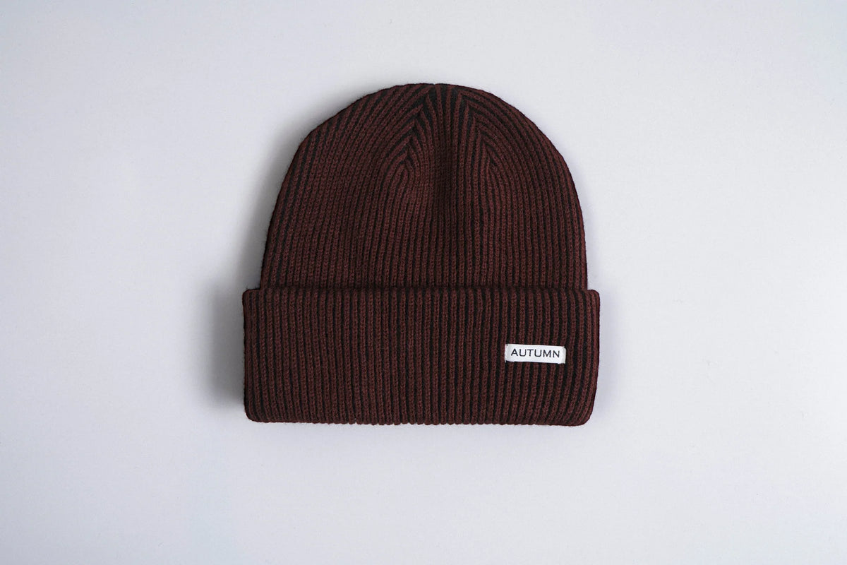 Autumn Headwear Autumn Cord Beanie in oxblood, cozy knit accessory with cord detailing, perfect for fall weather.